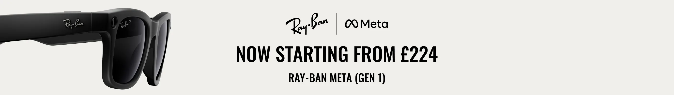 Close-up promotional image of black Ray-Ban smart sunglasses created in collaboration with Meta. The glasses are shown from a side angle, highlighting the thick frame, dark lenses, and subtle logo details. Text above reads: “Now starting from £244 – Ray-Ban Meta (Gen 1).”