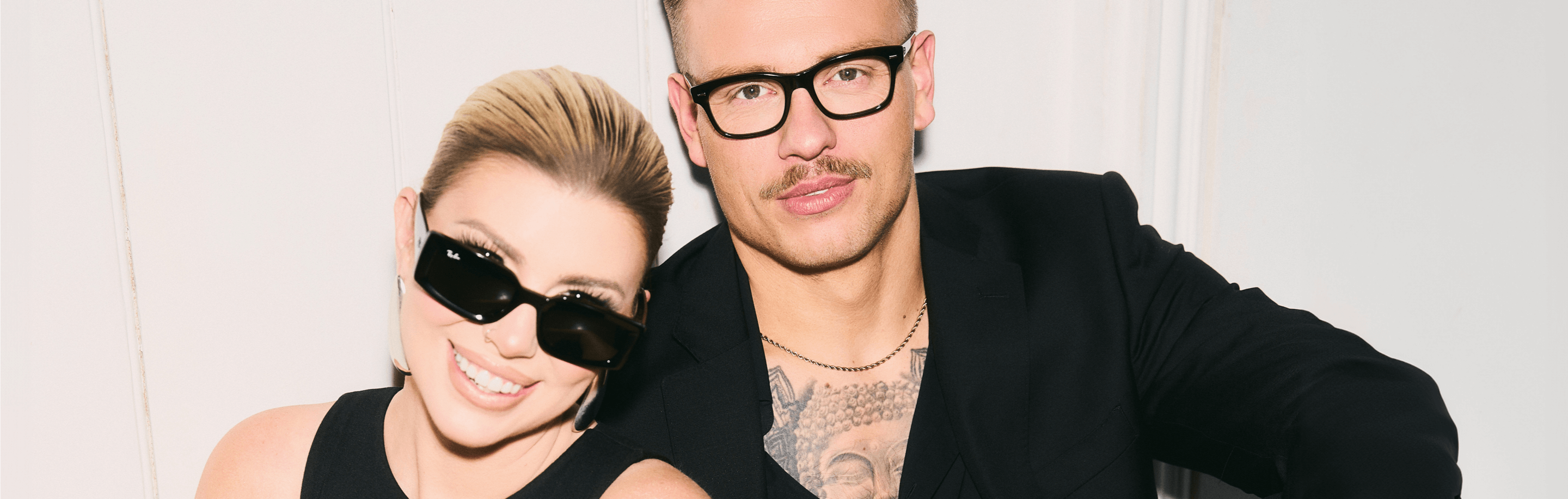 Olivia and Alex Bowen wearing Vision Express eyewear and styled as different celebrities